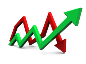 A red and green arrow pointing up on top of a graph.